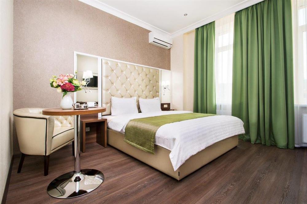 Bonapart Hotel By Uhm Kiev Habitación foto